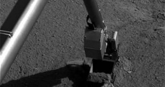 Image showing the robotic arm of the Phoenix lander in standby after coming in contact with 'Alice'