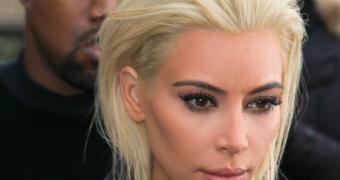 Kim Kardashian looks particularly dead-eyed on first outing as platinum blonde / Draco Malfoy lookalike