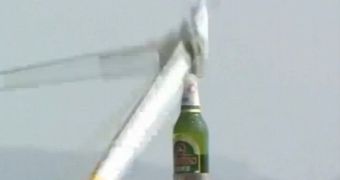 Pilot loses competition, even though he opens a beer bottle with a helicopter
