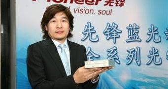 Shannon Yu, Pioneer's Optical Disc Drive Sales general manager for Asia-Pacific, displays BDC-S02