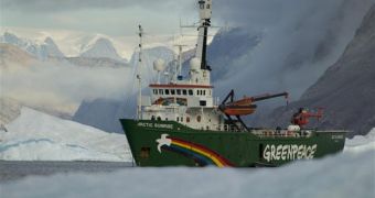 Russian authorities charge 28 Greenpeace activists, a journalist and a videographer with piracy