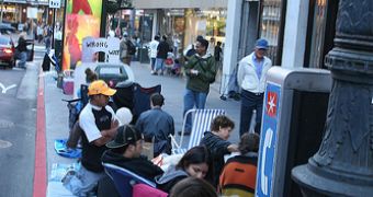 People waiting in line outside a US Apple Store a day before the iPhone was released