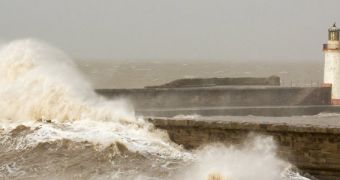 Massive waves batter UK's coastline, triggered by an area of low atmospheric pressure in the Atlantic Basin
