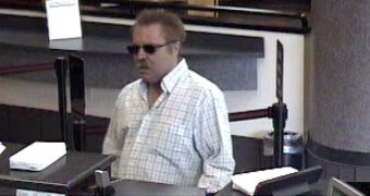 Plunger bank robber was arrested and is awaiting prosecution