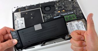 The MacBook's new battery removed