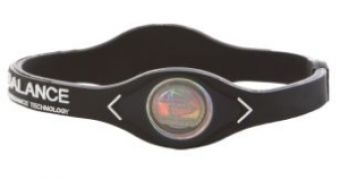 The Power Balance silicone wristbands promise to make us faster, leaner and improve balance