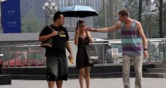Andrew Hales steals umbrellas as a joke in China
