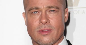 Brad Pitt shows off his new ‘do on the red carpet at the Producers Guild Awards 2014