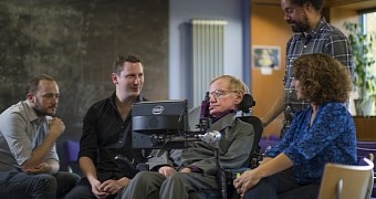 Professor Hawking with the new communication array and the team who made it