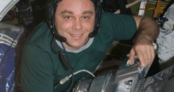 A photo of Expedition 22 flight engineer and Russian cosmonaut Maxim Suraev