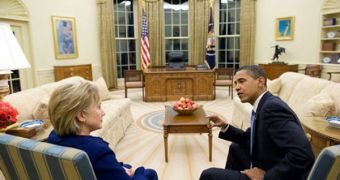 President Obama consulting with State Secretary Clinton in the Oval Ofice