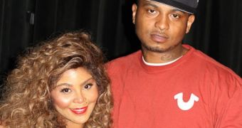 Lil' Kim and Mr. Papers make a baby