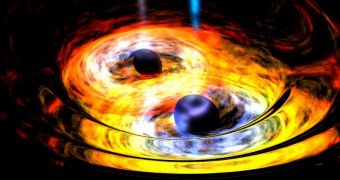Artist's impression of the two supermassive black holes at the core of galaxy recently discovered by WISE