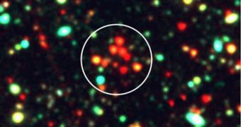 This Hubble/Spitzer composite image eventually lead investigators to discover the oldest galactic cluster