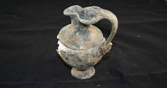 Bronze jug found inside the grave