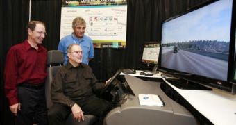 Craig Mundie (center), Microsoft chief research and strategy officer, and Rick Rashid (left), senior vice president, Microsoft Research, watch a demonstration by researcher Ivan Tashev (right) of Commute UX