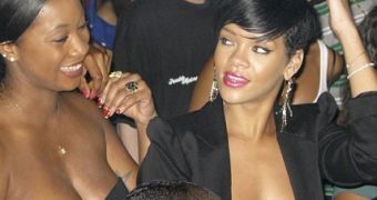 Rihanna rocks black tuxedo jacket with nothing underneath it but sequined pasties