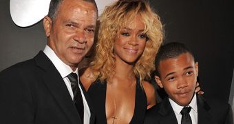 Rihanna with her father and brother backstage at the Grammys 2012