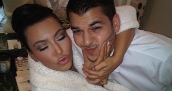Back in better days: Kim and now-estranged brother Rob Kardashian