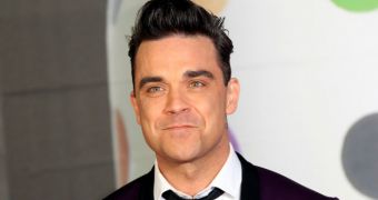 Robbie Williams ditches the Take That reunion tour in favor of his family