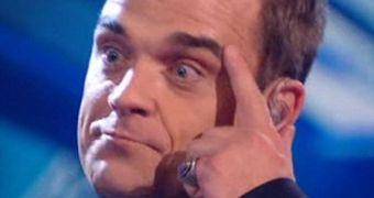 Robbie Williams performs “Bodies” on X Factor in October 2009