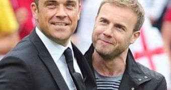Robbie Williams and Gary Barlow release “Shame” duet