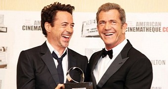 Robert Downey is trying to get Hollywood to forgive Mel Gibson
