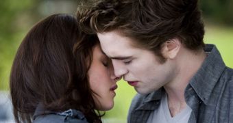 Robert Pattinson and Kristen Stewart as Edward and Bella in “The Twilight Saga”