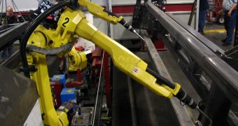 Articulated welding robots used in a factory; Japan wants to boost its agriculture with the help of high-tech gadgets