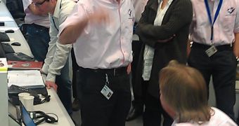Operations manager Andrea Accomazzo gestures happily in the Rosetta control room at ESOC on June 8, moments after the “enter hibernation mode” command was sent to Rosetta