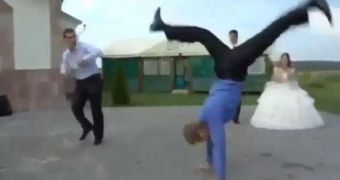 Men breakdance at wedding