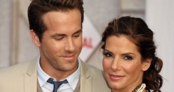 Ryan Reynolds, Sandra Bullock and baby Louis are “like one happy little family,” says report