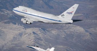 An F/A-18 mission support aircraft shadows NASA's Stratospheric Observatory for Infra-red Astronomy, or SOFIA, 747SP during a functional check flight