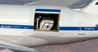 SOFIA in flight, with its telescope door opened