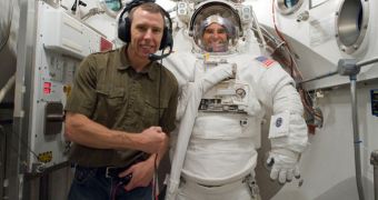 This is NASA astronaut Greg Chamitoff, STS-134 mission specialist, during a space suit check back on Earth
