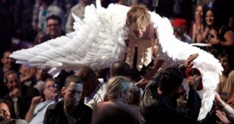 Sacha Baron Cohen as Bruno, the gladiator angel, lands in Eminem’s lap at MTV Movies Awards