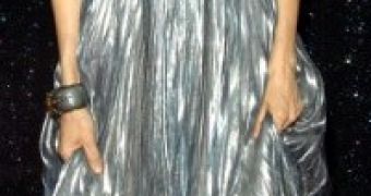 Sarah Jessica Parker looks fabulous in the metallic silver dress