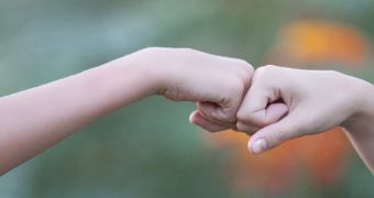 Fist bumps found to be safer than handshakes and high-fives