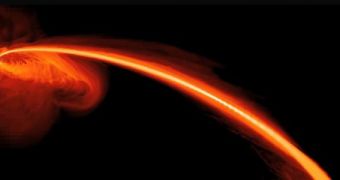 A black hole is seen here consuming a stream of matter from a nearby star that wandered too close to the dark behemoth