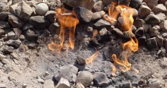 Natural gas burning as it seeps through the ground to the surface