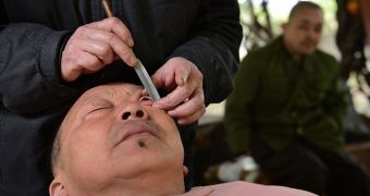 Chinese man gets his eyeballs cleaned