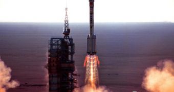 This rocket shows the launch of the Shenzhou 5 capsule, aboard a Long March 2F rocket
