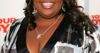 With the help of a personal trainer and a healthier diet, Sherri Shepherd has lost 41 pounds, dropping ten dress sizes