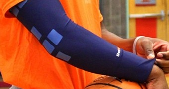 ShotTracker sleeve covering the wrist device