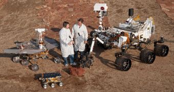 Curiosity is seen here compared to a replica of Spirit and Opportunity, and to the much-smaller Sojourner, rover