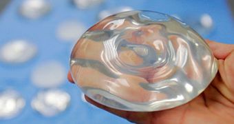 Woman’s life is saved by breast implant, as it deflects knife of the blade
