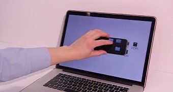 Smartphone showed controlling a laptop