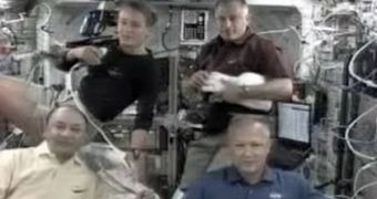 Wolf (top right) is seen in this Monday video talking about the dangers of space sneezing