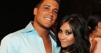 Snooki and fiancé Jionni LaValle stand to make a fortune off the exclusive photos of their son