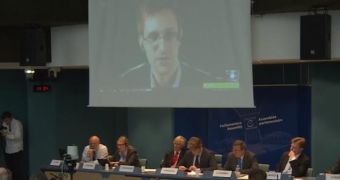 Snowden talks about the way the NSA manages to continue spying despite existing laws
